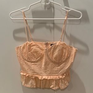 Forever21 pale pink floral embroidered peplum crop top